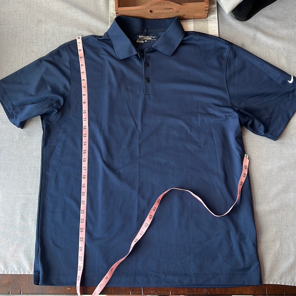 Nike Dri Fit polo shirt.  Navy Blue Excellent condition.